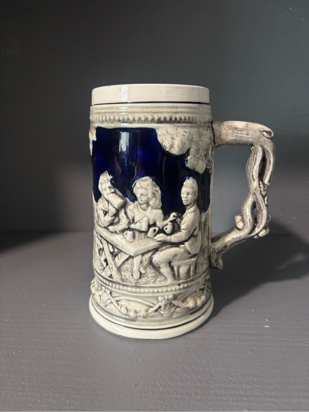 Decorative Vintage-Style Ceramic Stein in Deep Blue and Cream